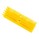 A yellow Carlisle Sparta deck scrub brush with bristles.