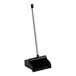 A black dustpan with a long white handle.