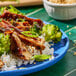 A plate of food with Eat Meati plant-based classic cutlet, rice, and broccoli.