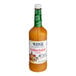 A 32 oz bottle of Ken's Golden Italian dressing with a green label.