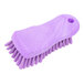 A purple Carlisle Sparta handheld scrub brush with a white handle.