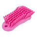 A Carlisle Sparta pink handheld scrub brush with bristles.