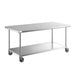 A Regency stainless steel work table with casters.