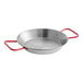 A Matfer Bourgeat carbon steel paella pan with red handles.