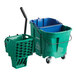 A green Carlisle OmniFit mop bucket with a blue wringer.