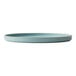 A Oneida Moira frosted blue stoneware plate with a white rim.