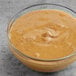 A bowl of Bare Nut Butter Salted Almond Butter on a table in a deli.