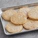 Daring Foods vegan plant-based chicken patties on a baking sheet.