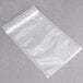 A package of ARY VacMaster clear plastic chamber vacuum bags with a zipper on a gray surface.