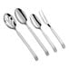 A group of Acopa stainless steel serving utensils with a spoon and fork.