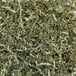 A pile of Spring-Fill Olive Crinkle Cut paper shred.