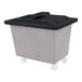 A black and grey plastic lid for a Royal Basket truck.