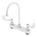 A chrome T&S deck-mounted workboard faucet with gooseneck spout and wrist action handles.