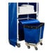 A blue Royal Basket Trucks laundry cart with 2 shelves.