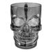 A white plastic skull-shaped mug with a black base.