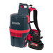 A red and black NaceCare Solutions backpack vacuum with carpet cleaning tools attached.
