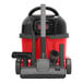 A red and black NaceCare Solutions Latitude cordless canister vacuum cleaner.