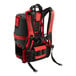 A red and black NaceCare Solutions Latitude cordless backpack vacuum.