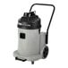 A grey and black NaceCare Solutions canister vacuum with wheels.