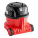A red and black NaceCare canister vacuum.