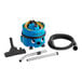 A blue NaceCare Solutions James ProSave canister vacuum with hose and accessories.