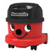A red and black NaceCare Solutions Latitude NBV 240NX cordless canister vacuum.