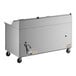 A stainless steel refrigerated pizza prep table with two doors, mounted on casters.