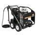 A black Mi-T-M hot water pressure washer with wheels and a hose attached.