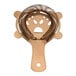 A bronze copper Hawthorne strainer with a metal coil on a handle.