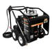 A black Mi-T-M electric hot water pressure washer with wheels and a hose.