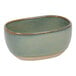 A Front of the House Artefact moss porcelain sugar caddy with a green and brown glaze.