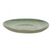 A close up of a Front of the House Artefact moss porcelain saucer with a gold rim.