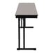 A gray National Public Seating folding table with black cantilever legs.