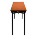 A National Public Seating rectangular table with a T-mold edge and a wild cherry top.