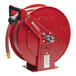 A red Reelcraft hose reel with a hose attached.