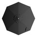 A black umbrella canopy for a round table with a handle.