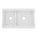 A white rectangular Zurn Elkay farmhouse sink with two round bowls.