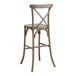 A Lancaster Table & Seating Vineyard Series Whiskey Brown Wood Outdoor Cross Back Bar Stool with a backrest.