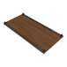 A brown melamine shelf for black metal garment racks.
