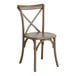 A Lancaster Table & Seating Vineyard Series Whiskey Brown Outdoor Cross Back Chair with a wooden cross back and seat.