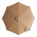 A top view of a tan circular umbrella canopy.