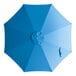 A blue circular Lancaster Table & Seating umbrella canopy.