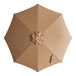 A top view of a tan circular umbrella canopy with a brown center.