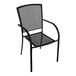 A black Holland Bar Stool outdoor chair with a mesh back.