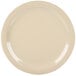 A tan Carlisle melamine plate with a white rim.