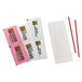A white paper envelope with red and pink sugar packets inside.