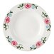 A Tuxton eggshell china pasta bowl with a floral design on it.