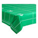 A green football field tablecloth with white lines on it.