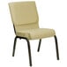 A beige Flash Furniture church chair with a gold vein metal frame.