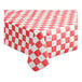 A red and white checkered Table Mate tablecloth on a table.